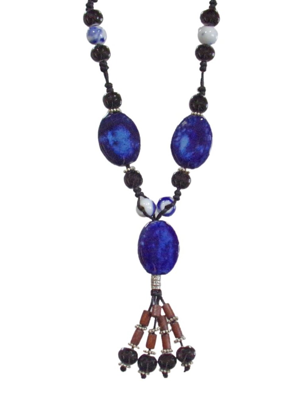 Blue ceramic bead tassel necklace with wood beads attached to a leather cord New